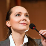 Everyday economics, success and voice pitch
